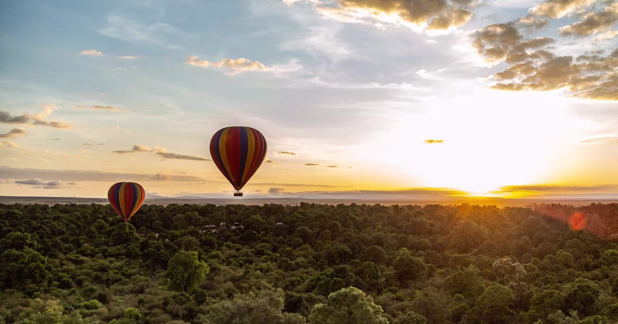 Hot air balloon safari at sunrise over the Maasai Mara