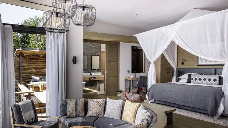 Sanctuary Olonana glass fronted suite on a private stretch of the Mara River, Maasai Mara